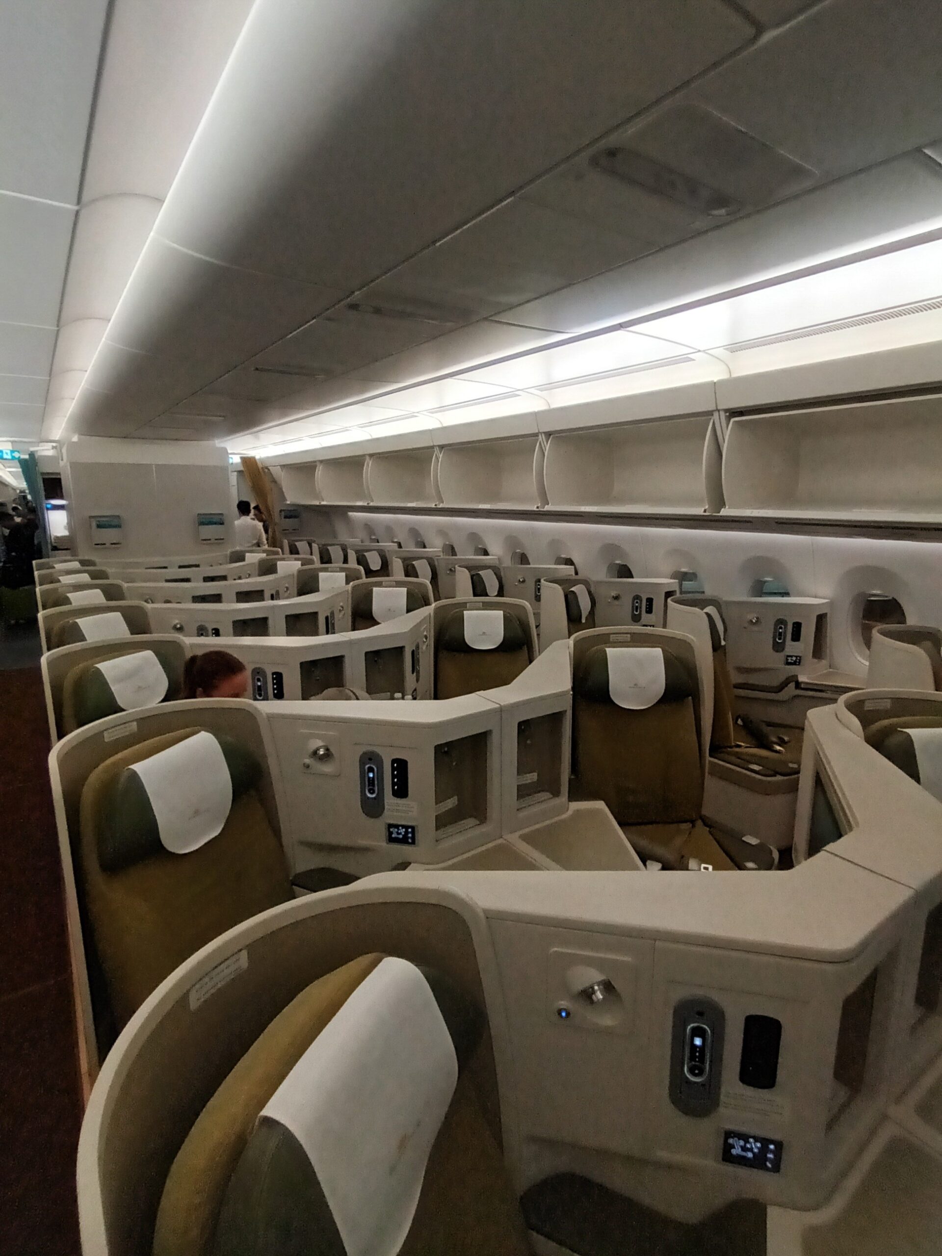 Business class cabin window view — the reward of a well-executed airline points strategy in 2026
